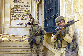 Marines searching Saddam Hussein's palace during Operation Iraqi Freedom